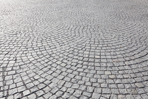 Old square cobble stone paving perspective background