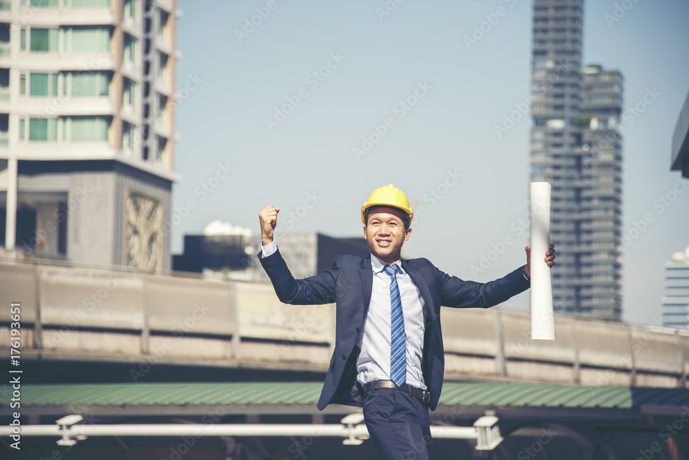 Success Engineer wear yellow helmet for safety hat building finish project. Success Concept. Success Engineer wear yellow helmet for safety hat building finish project. Success Concept.