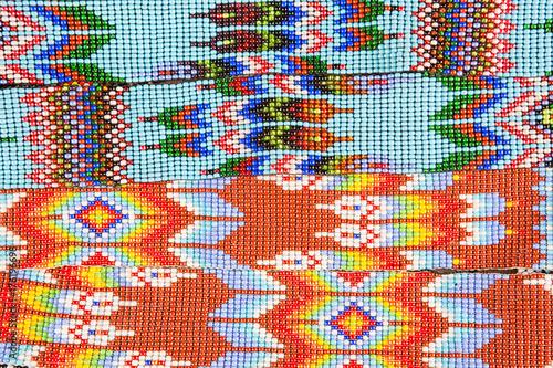 San Pedro la Laguna, Guatemala: closeup details of mayan traditional pattern created with small size glass beads photo