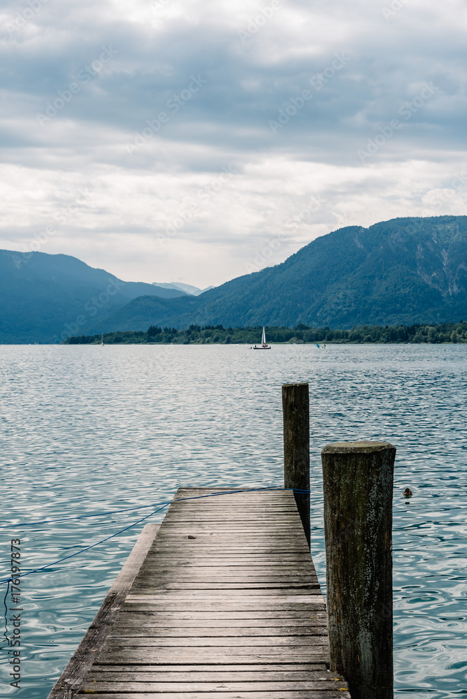 Pier in Mondsee lake a summer day