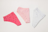 Women's panties with lace pink on a white background