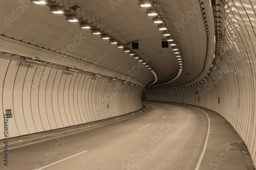 Bend in a road tunnel without traffic