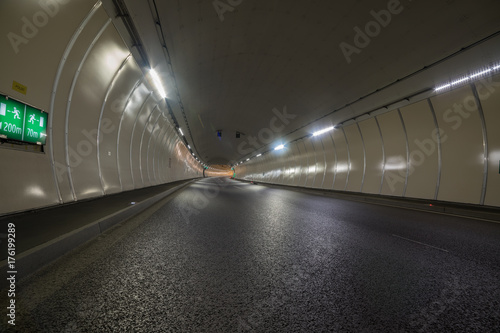 Bend in a road tunnel without traffic