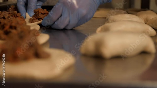 Baker working with bread dough