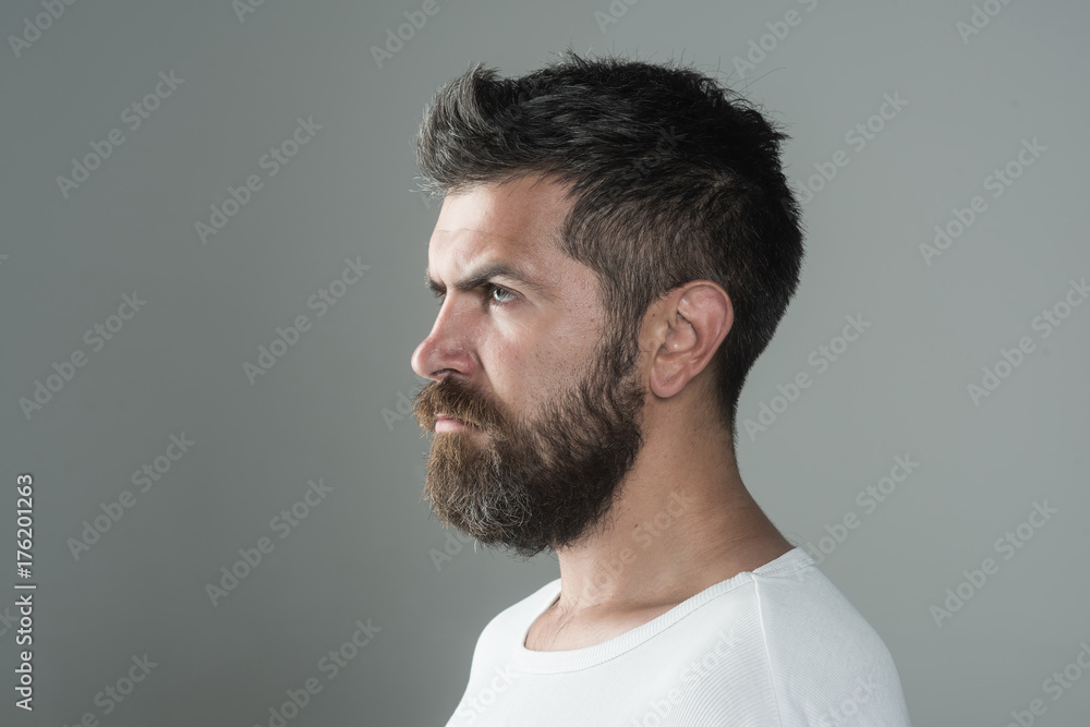 Obraz premium Guy or bearded man on grey background.