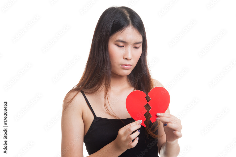 Beautiful young Asian woman with broken heart. Beautiful young Asian woman with broken heart.