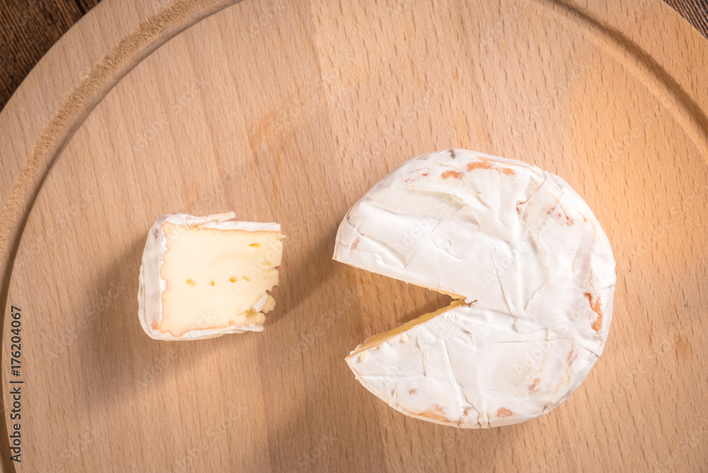 Cheese Camembert on a wooden board