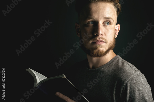 man holding a bible