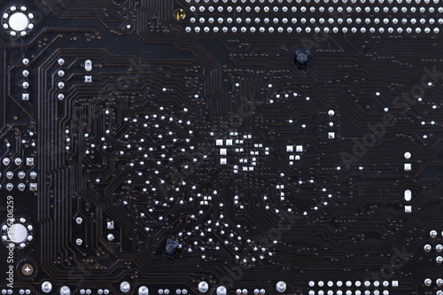 Image of abstract circuits on mainboard background. Equipment and computer hardware