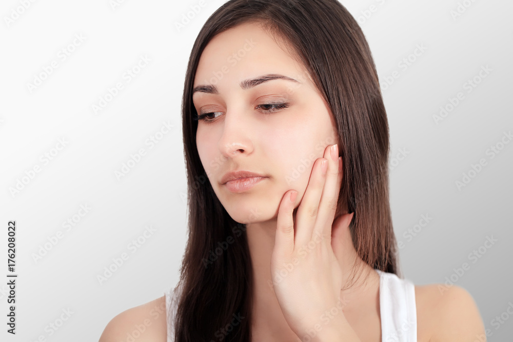 Teeth Problem. Woman Feeling Tooth Pain. Closeup Of Beautiful Sad Girl Suffering From Strong Tooth Pain. Attractive Female Feeling Painful Toothache. Dental Health And Care Concept. High Resolution Teeth Problem. Woman Feeling Tooth Pain. Closeup Of Beautiful Sad Girl Suffering From Strong Tooth Pain. Attractive Female Feeling Painful Toothache. Dental Health And Care Concept. High Resolution