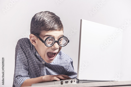 Funny computer geek with his laptop