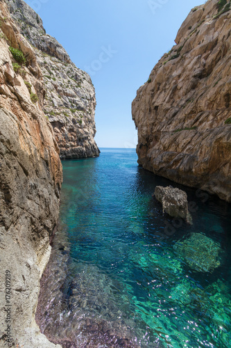 Wied Babu, at Wied iz-Zurrieq, azure blue turquoise waters at the bottom of the valley, next to the Blue Grotto, Zurrieq, Malta, May 2017