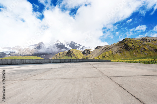 empty marble floor with beautiful snow mountains