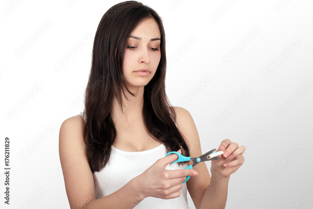 Healthy Young Woman Refusing To Take Cigarette From Pack. Portrait Of Beautiful Female Showing Stop Sign With Hand To Cigarettes. Quit Smoking Concept. High Resolution Healthy Young Woman Refusing To Take Cigarette From Pack. Portrait Of Beautiful Female Showing Stop Sign With Hand To Cigarettes. Quit Smoking Concept. High Resolution