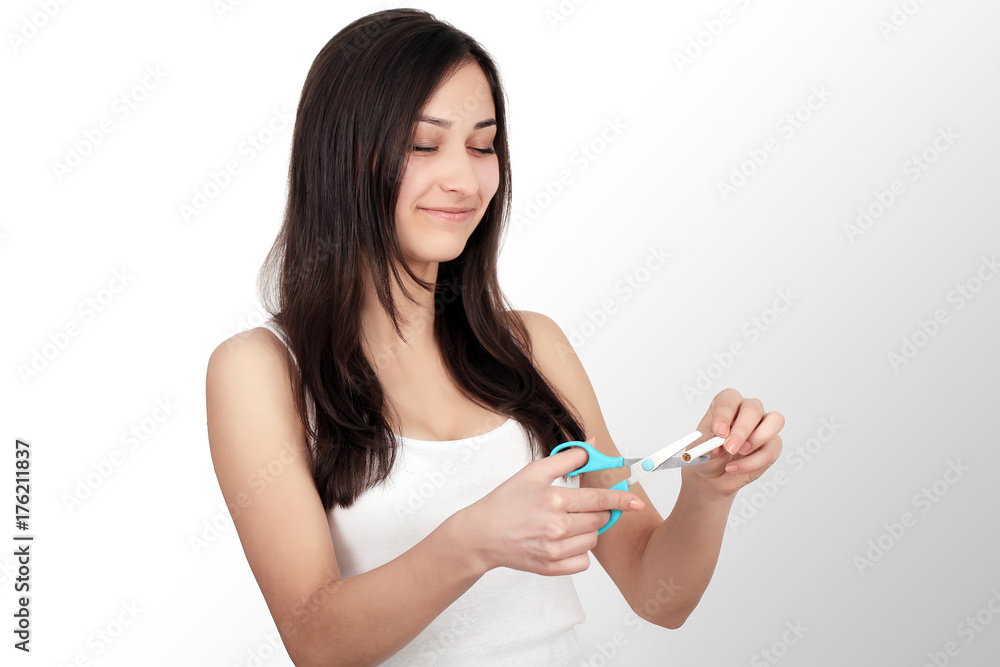 Healthy Young Woman Refusing To Take Cigarette From Pack. Portrait Of Beautiful Female Showing Stop Sign With Hand To Cigarettes. Quit Smoking Concept. High Resolution Healthy Young Woman Refusing To Take Cigarette From Pack. Portrait Of Beautiful Female Showing Stop Sign With Hand To Cigarettes. Quit Smoking Concept. High Resolution