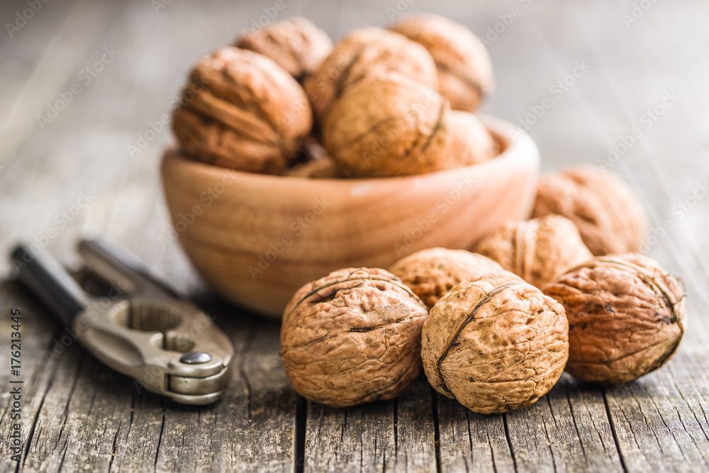 Tasty dried walnuts and nutcracker. Tasty dried walnuts and nutcracker.