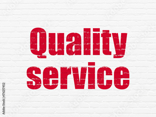 Business concept: Quality Service on wall background