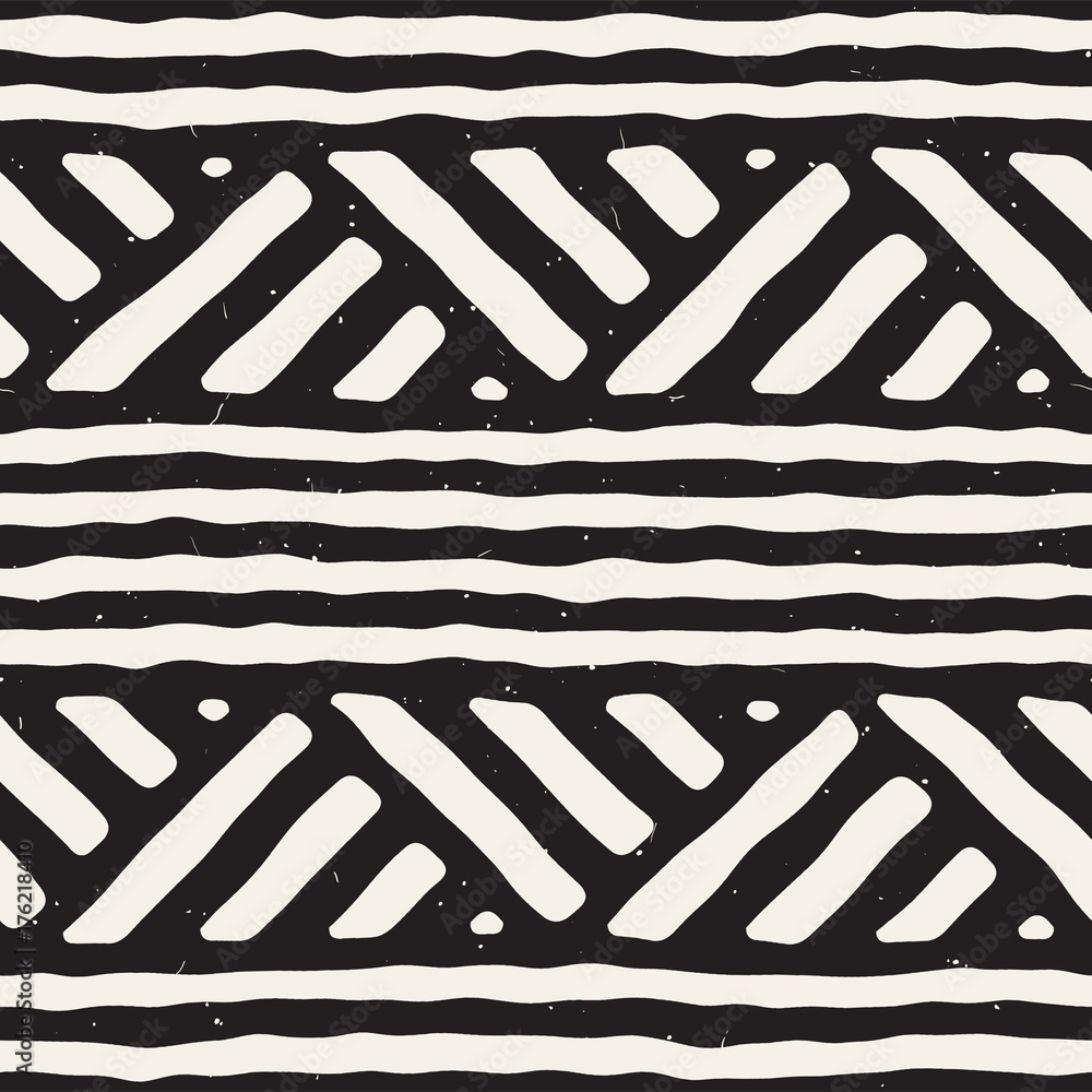 Hand drawn style ethnic seamless pattern. Abstract geometric tiling background in black and white. Hand drawn style ethnic seamless pattern. Abstract geometric tiling background in black and white.
