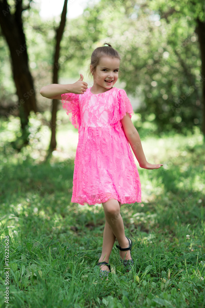 Caucasian girl posing on camera showing approving sign with hands Caucasian girl posing on camera showing approving sign with hands