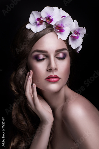 Portrait of beautiful brunette with wreath © jyliagorbacheva