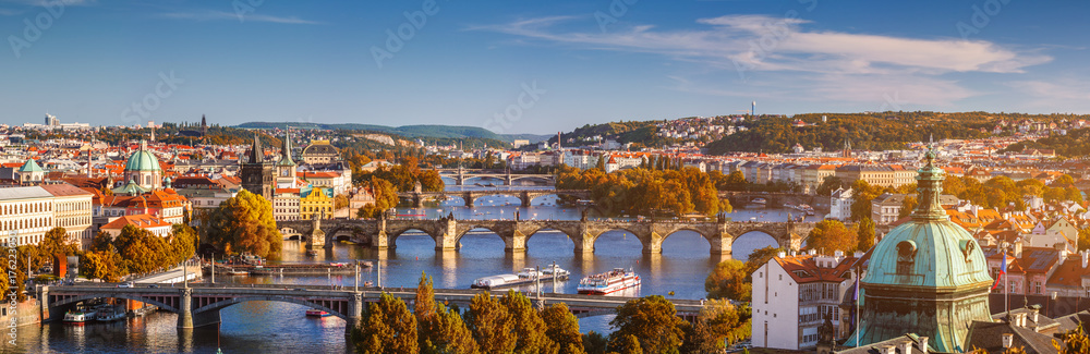 Fototapeta premium Prague, Czezh Republic. Scenic autumn aerial view of the Old Town with red foliage