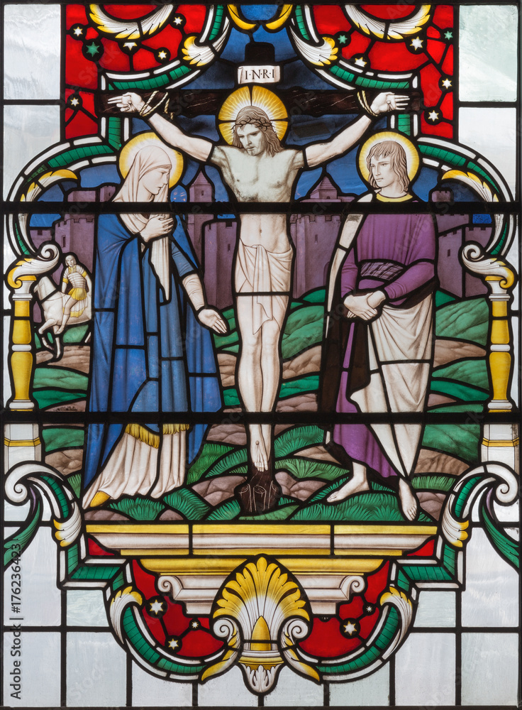 LONDON, GREAT BRITAIN - SEPTEMBER 14, 2017: The Crucifixion of Jesus Christ on the stained glass in church St. Lawrence Jewry by Christopher Webb (half of 20. cent.).