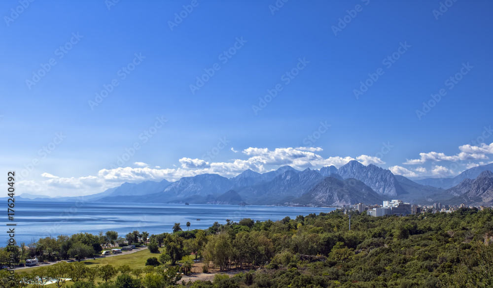 Panoramic view on Antalya beach, mountains and Mediterranean Sea from the Beach park. Antalya, Turkey