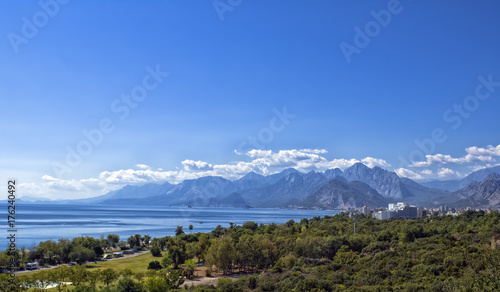 Panoramic view on Antalya beach, mountains and Mediterranean Sea from the Beach park. Antalya, Turkey