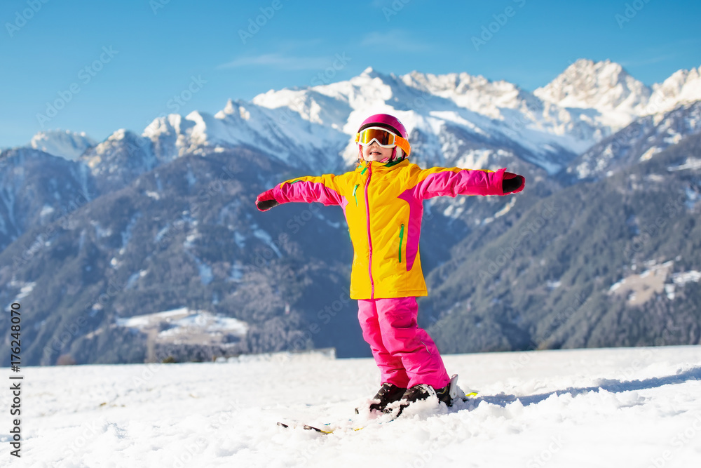 Kids winter snow sport. Children ski. Family skiing.