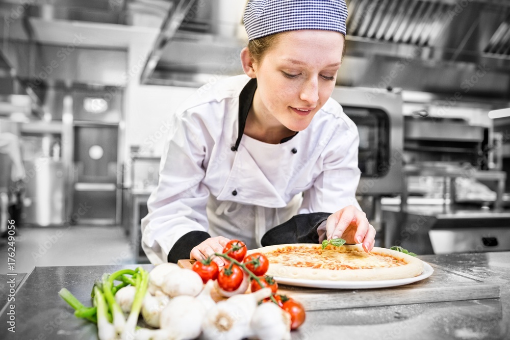 Woman kitchen help preparing pizza