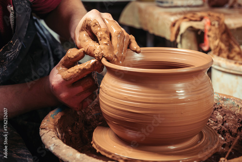 Potter at work. Workshop.