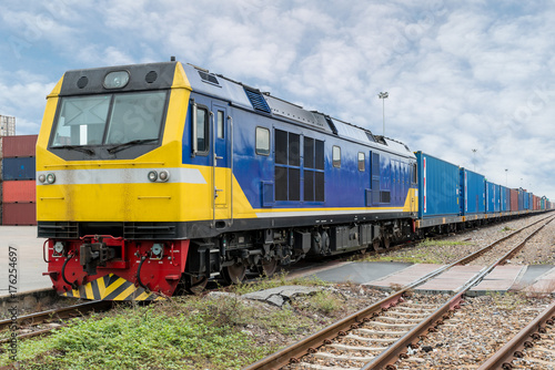 Cargo train platform with freight train container at depot in port use for export logistics background.