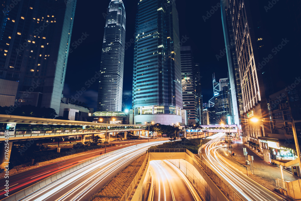Fototapeta premium Night busy traffic in Hong Kong downtown city. Asia.