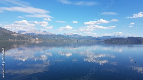 clouds lake blue color reflection autumn in lake Pamvotis Ioannina