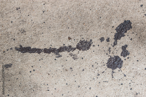 Cement surface with oil stain texture