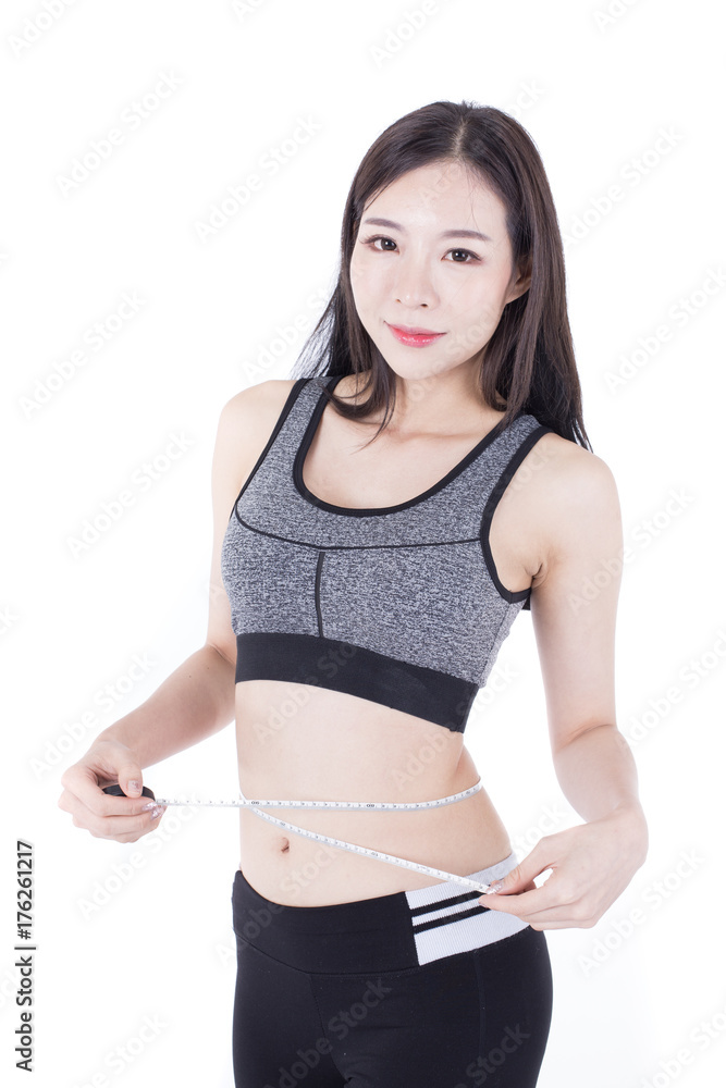Portrait of Korean Woman holding tape with her body on white backgrond, Woman prepare to exercise, Woman with Healthy Concept. Portrait of Korean Woman holding tape with her body on white backgrond, Woman prepare to exercise, Woman with Healthy Concept.