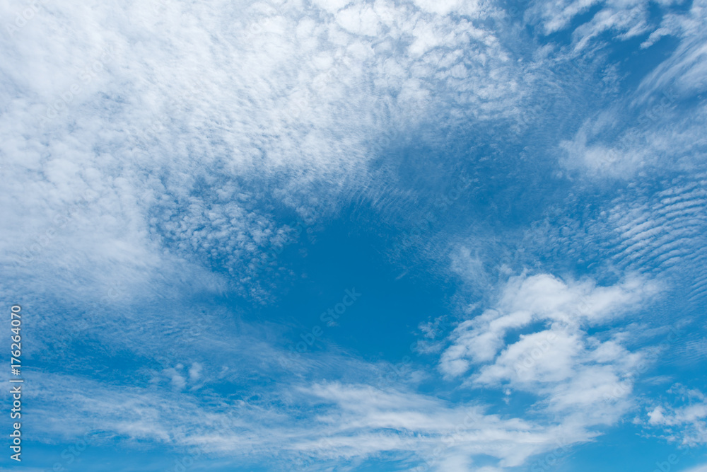 Cirrostratus cloudscape or Fluffy cirrus clouds on blue blue sky, Beautiful cirrocumulus on the high altitude layer Cirrostratus cloudscape or Fluffy cirrus clouds on blue blue sky, Beautiful cirrocumulus on the high altitude layer