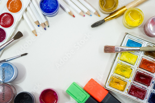  Hobby. Paints, brushes, pencils. White background