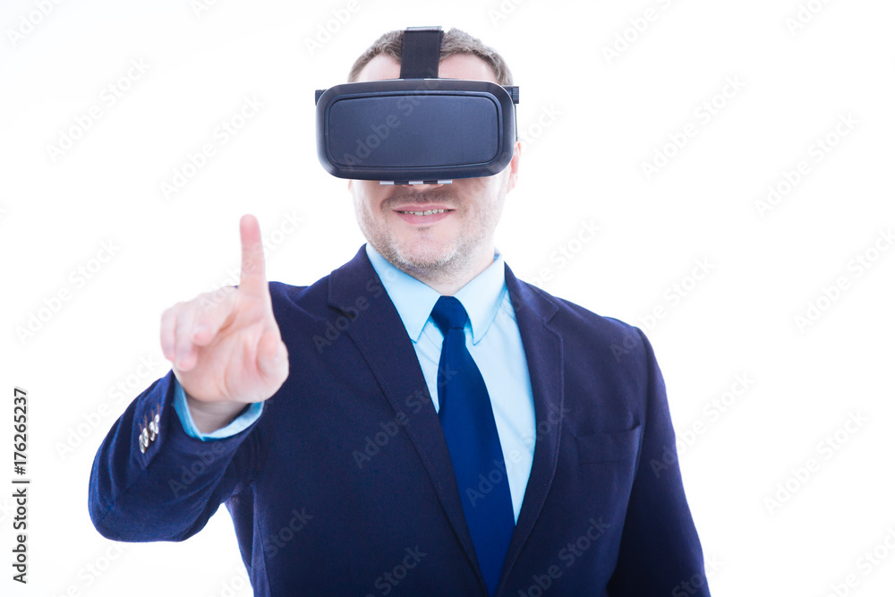 Delighted happy man standing in front of the virtual screen Delighted happy man standing in front of the virtual screen