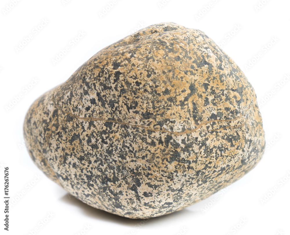 Single natural stone on white background, close-up Single natural stone on white background, close-up