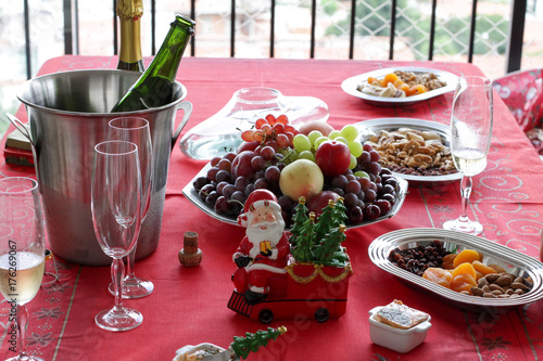Brazilian Christmas table with tropical fruits, nuts, seeds and wine photo