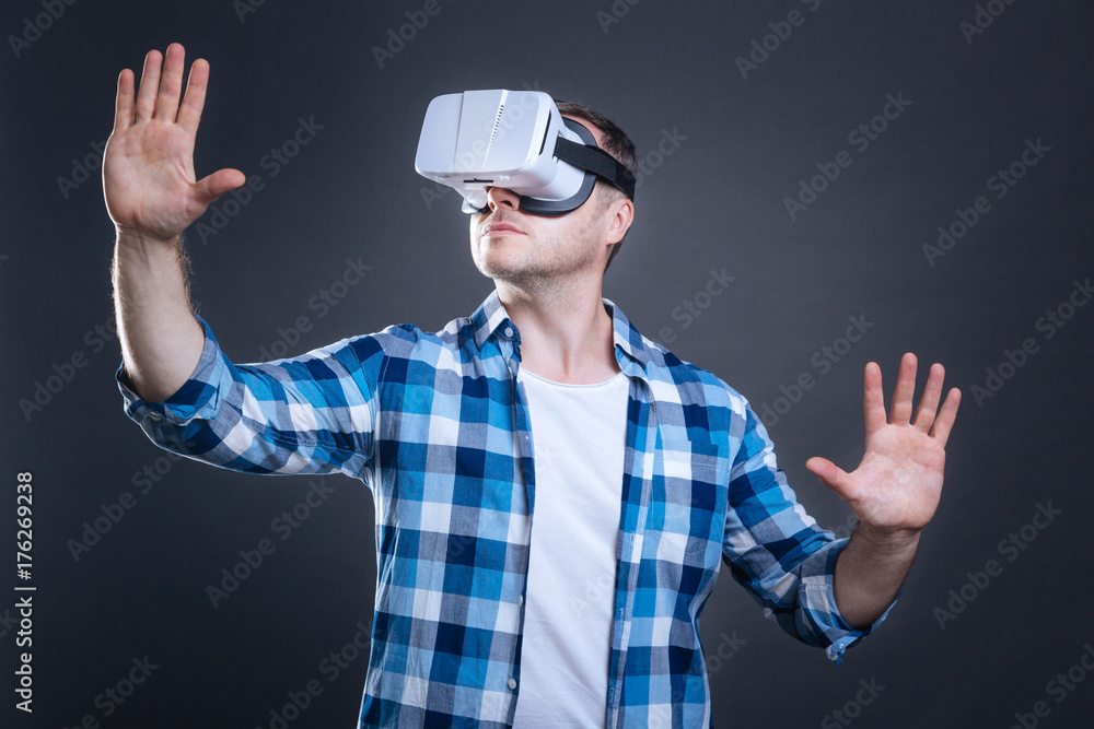 Nice adult man enjoying alternative reality Nice adult man enjoying alternative reality