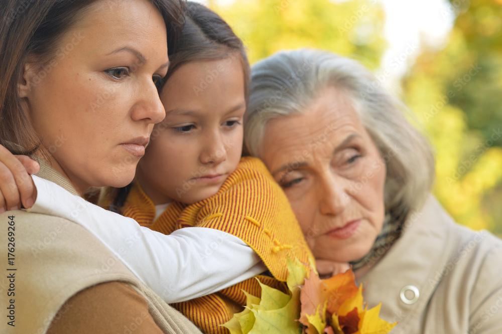 sad women with little girl sad women with little girl