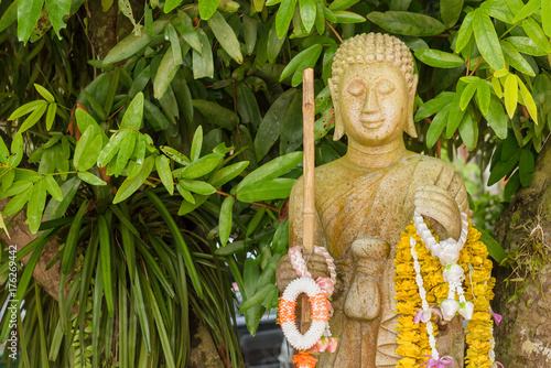 Golden buddha statue in church in Rongngae temple at Nan Province, ThailandThailand. photo