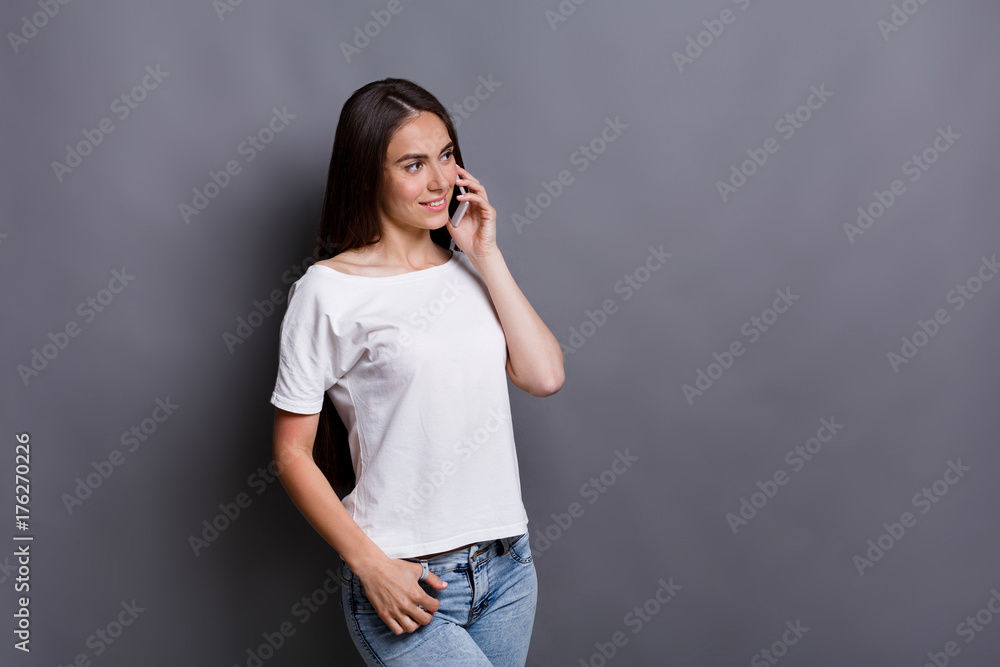 Smiling beautiful woman talking on phone Smiling beautiful woman talking on phone