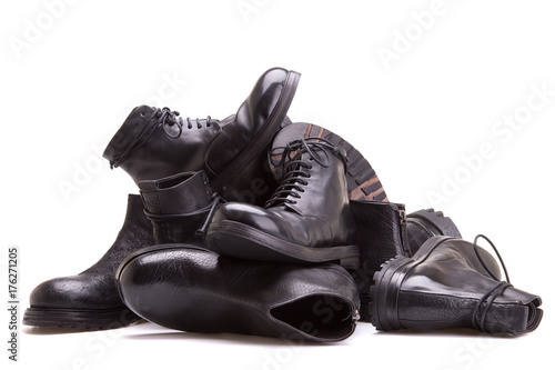 Pile of shoes on a white background
