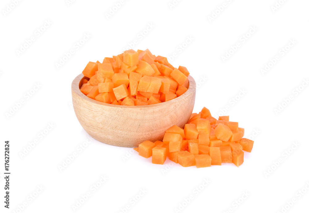 fresh portion cut carrot cube in wooden bowl and on white background fresh portion cut carrot cube in wooden bowl and on white background