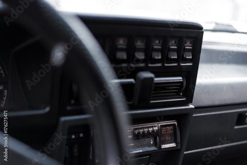 Black dashboard of the old car © speed300