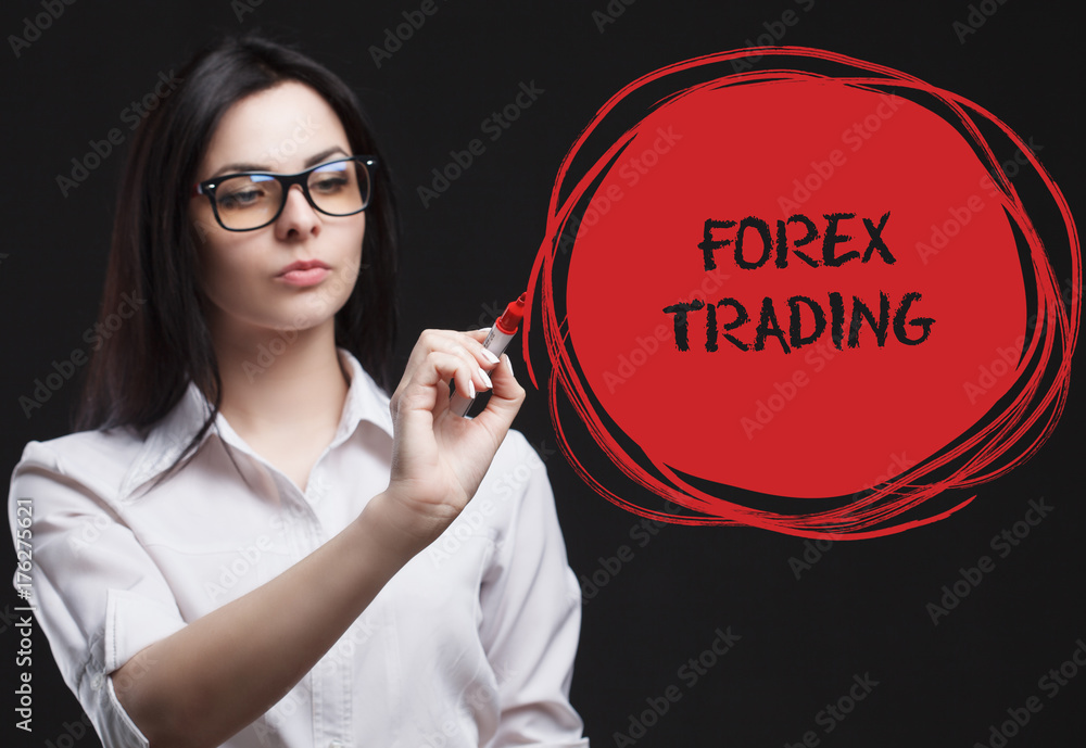 The concept of marketing, technology, the Internet and the network. A young businessman shows what is important for business: Forex trading The concept of marketing, technology, the Internet and the network. A young businessman shows what is important for business: Forex trading