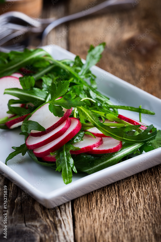 Salad with rucola and radish Salad with rucola and radish